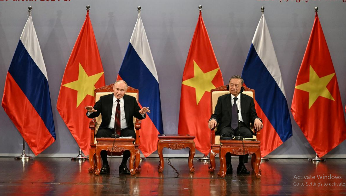 Putin signs deals with Vietnam in bid to shore up ties in Asia