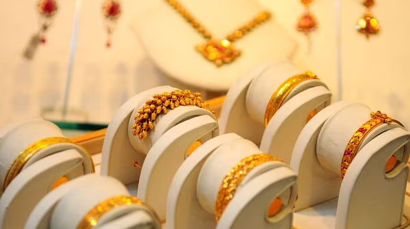Gold heads for weekly loss, drops over 2% on strong US jobs report, China data; silver sheds 6%